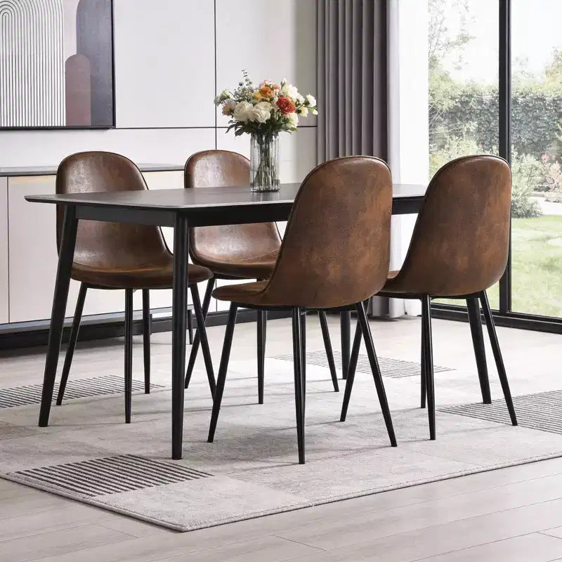 Lot de quatre chaises de salle à manger HomeRoots en similicuir suédé noir et expresso avec structure en acier
