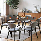 TUYOHW Table à Manger Ronde de 47'' pour 4 Personnes, Noire Moderne avec Pieds en Métal Entrecroisés et Patins Réglables, Style Industriel pour Cuisine, Salle à Manger et Bureau