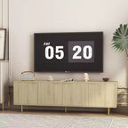 Meuble TV moderne VIYET 69 cannelé pour téléviseurs de plus de 55 pouces, console média en MDF noir avec 4 portes de rangement et pieds dorés