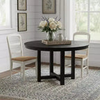 Table à manger ronde HomeRoots 45 à plateau en bois massif noir avec pieds croisés