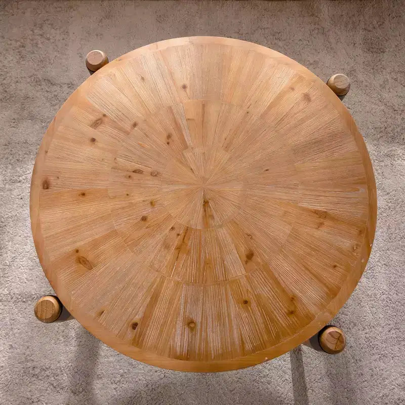 Table basse ronde radiale JVNOXK36.22 - Table basse rustique en bois massif et MDF avec pieds accentués noirs, finition bois naturel pour salon