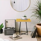 Table d'appoint jaune/noir Heather Dutton Rise and Shine - Deny Designs : Bouleau de la Baltique, pieds en acier, conçu par un artiste